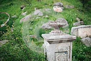 Old ruined antique concrete flower pot garden vase