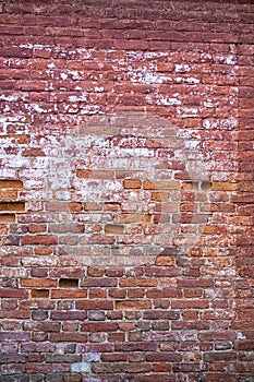 Old ruined brick wall texture, potholes and cement clay