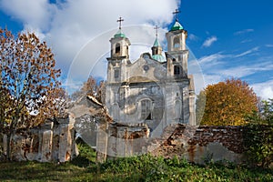 Old ruined catholic church of the Holy Trinity in autumn, Benitsa, Belarus