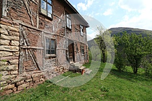 Old ruined house adobe and wood facade in village Gara Bov, Bulgaria