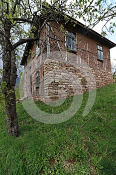 Old ruined house adobe and wood facade in village Gara Bov, Bulgaria