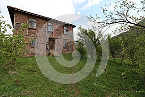 Old ruined house adobe and wood facade in village Gara Bov, Bulgaria