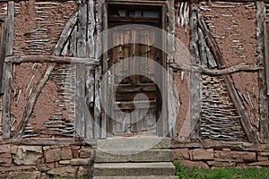 Old ruined house adobe and wood facade in village Gara Bov, Bulgaria