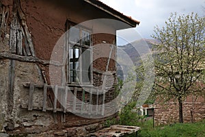 Old ruined house adobe and wood facade in village Gara Bov, Bulgaria