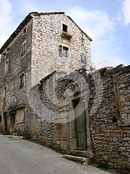 Old ruined house with broken windows and doors in Zminj in Istria,Croatia