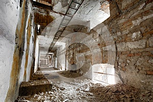 Old ruined industrial building corridor, interior