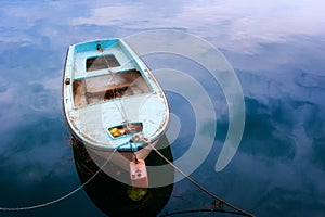 Old ruined ship moored in the river port