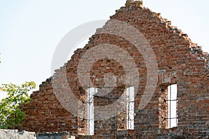 Old ruined stone house in the village. Red brick house built in the last century. Historical value. Demolition of buildings