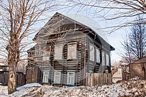 Old ruined two-storey wooden house