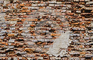 Old ruins brick wall with concrete cracked