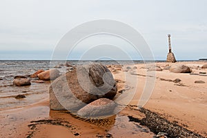 Old ruins of lighthouse on the shore of Baltic sea