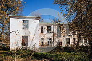 An old run down, weather beaten house that is in need of repair