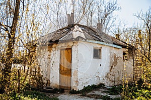 An old run down, weather beaten house that is in need of repair