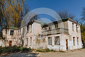 An old run down, weather beaten house that is in need of repair