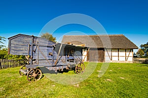 Old rural barn in Poland and threshing-machine- XIXth century