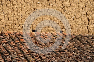 Old rural clay brick wall and roof