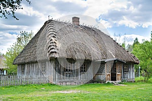 Old rural house with thatched roof