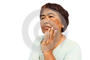 Old rural woman with blemish , acne , mole and wrinkle on her face photo
