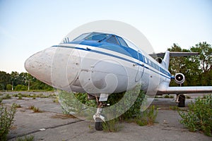 Old russian airplane is on the disused airfield