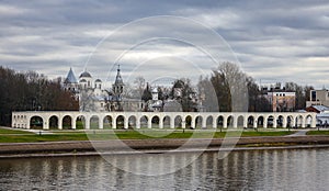 Old Russian architecture of Yaroslav`s courtyard in the autumn in Veliky Novgorod