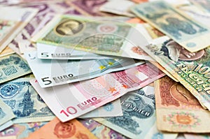 Old Russian banknotes and Euro