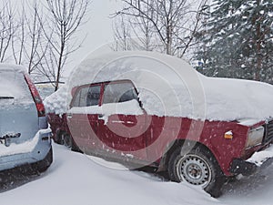 Old Russian Car Under the Snowdrift