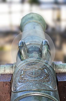 Old russian naval canon with crest photo