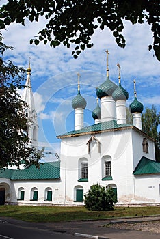 Old Russian orthodox church building in Yaroslavl. Tree trunks.