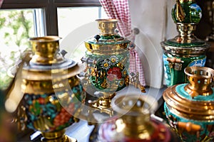 Old Russian samovar stands at the window