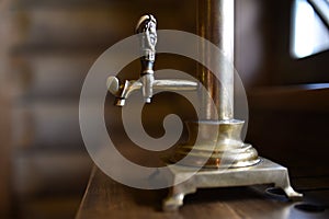 Old Russian samovar stands at the window