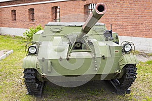 Old Russian self-propelled gun on the stand.
