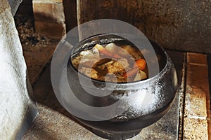 Old Russian stove with cast iron. rustic village style