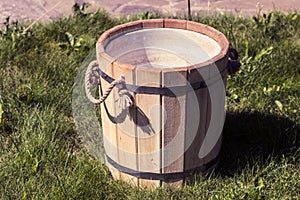 Old Russian traditional folk wooden vintage bucket for bath