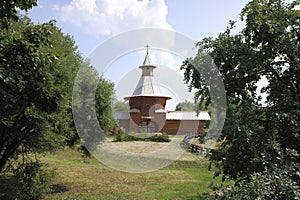 Old Russian wooden fortress among rural landscape in Kolomenskoye district of Moscow, Russia.