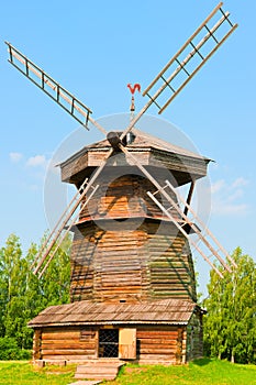 Old Russian wooden windmill.