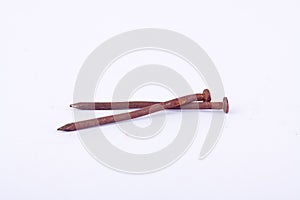 old rust nail tack used on white background tool isolated