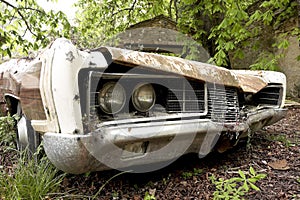 Old rusted and abandoned car