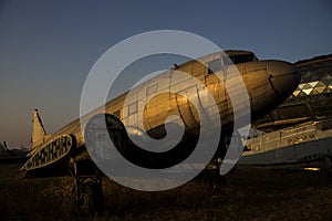 Old Rusted Airplane Abandoned in Junkyard at the Airport