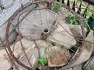 Old, rusted Bicycle wheel rim photo