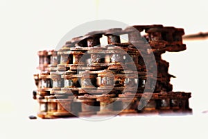 old rusted cycle chain in a white background