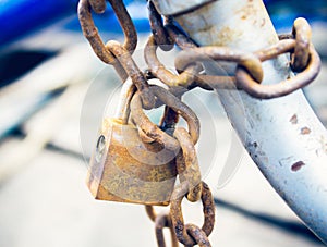 Old rusted lock and chain.