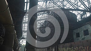Old rusted metal constructions of the abandoned metallurgic plant.