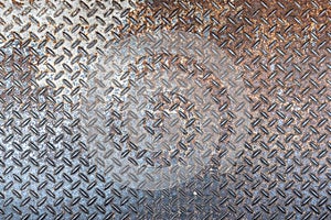 Old and rusted Metal diamond plate pattern texture, background