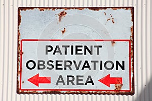 Old rusted observation area sign
