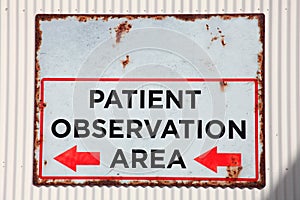 Old rusted observation area sign photo