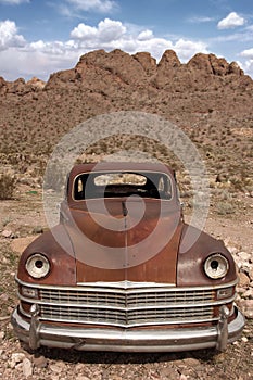 Old Rusted Out Car in the Desert