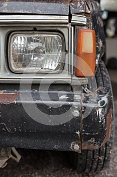 Old and rusted pickup truck close up