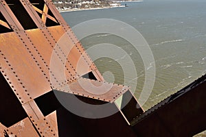 Old rusted structure made of plates and riveted joints