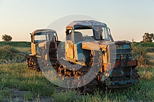 Old rusted tractor on the grass