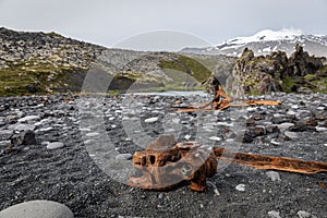 Old, rusted wreckage of the fishing trawler Epinen on the beach.